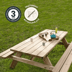 Zoom sur la table de pique-nique FESTIN avec des icônes signalant sa garantie et son traitement