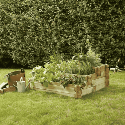 Carré potager ANGELIC 154L vue de 3/4 en situation dans un jardin avec des plantations dedans