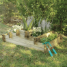 Carré potager podium ANGELIC en situation dans un jardin avec des plantations dedans