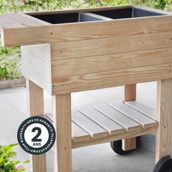 Zoom sur la desserte potagère en bois PRUNELLA avec un icône signalant sa garantie