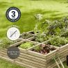 Carré potager au sol Horizon 380L en situation dans un jardin, avec des icônes signalant son traitement, sa garantie et son géot