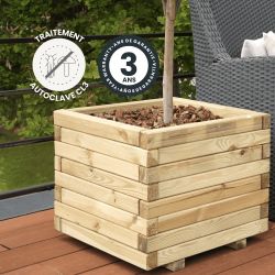 Bac à fleurs carré en bois sur une terrasse en bois, affichant une garantie de 5 ans et un traitement autoclave classe 3 une 