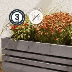 Zoom sur le bac à fleurs GETEBORG, avec des icônes signalant sa garantie et son traitement