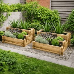 Deux carrés potager ANGELIC 140L vue de 3/4 en situation dans un jardin avec des plantations dedans