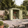 Armoire de jardin THEOFIL en situation dans un jardin, les portes ouvertes montrent les étagères remplies