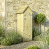 Armoire de jardin OPALE en situation dans un jardin, la porte fermée